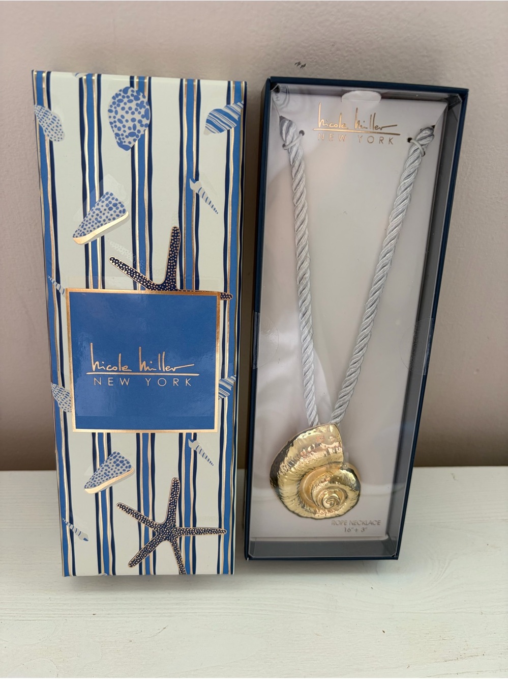 Nicole Miller Gold Shell Pendant on White Twisted Cord Necklace